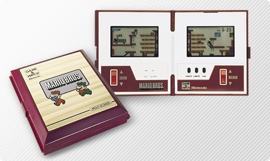 Two Nintendo Game & Watch Multi Screen Mario Bros. handheld devices.