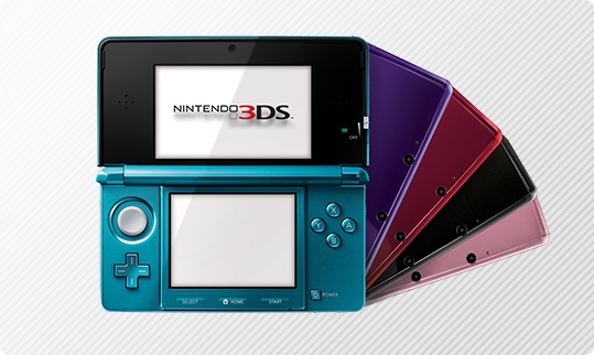 Nintendo 3DS handheld systems in metallic blue, purple, red, black, and pink colors. One system is open to show dual screens.